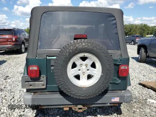 2001 Jeep Wrangler Sahara with VIN 1J4FA59S61P373670, listed as a Copart auction lot 74060614 with 176,111 mi miles and Clean Title. Bid and sale history available at carsss.com. Image 6.