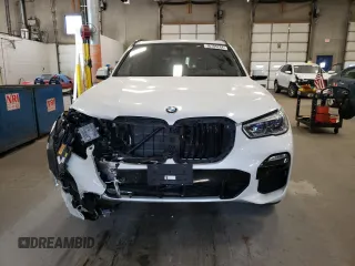 2020 BMW X5 M50i with VIN 5UXJU4C00L9C27198, listed as a Copart auction lot 76705264 with 0 mi miles and Salvage Title. Bid and sale history available at carsss.com. Image 5.
