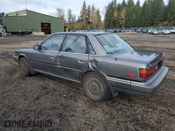 1988 Toyota Camry LE z VIN JT2SV22E0J0237998, wystawiony jako Copart lot #78850584 z przebiegiem 165 880 mil mil oraz Szkoda całkowita • Salvage title. Historia ofert i sprzedaży dostępna na DreamBid. Obrazek 2.