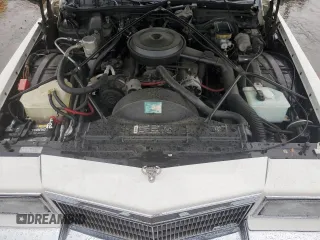 1992 Cadillac Brougham with VIN 1G6DW54E5NR708009, listed as a Copart auction lot 56849345 with 83,203 mi miles and Salvage title. Bid and sale history available at DreamBid. Image 11.