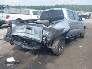 2023 Toyota Tacoma SR with VIN 3TYCZ5AN2PT176554, listed as a IAAI auction lot 42148651 with 15,255 mi miles and . Bid and sale history available at DreamBid. Image 4.
