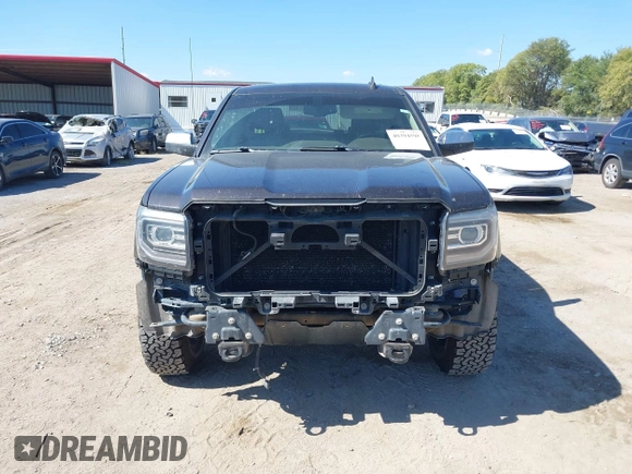 2016 GMC Sierra 1500 SLT with VIN 3GTU2NEC4GG285688, listed as a IAAI auction lot 40394598 with 121,940 mi miles and . Bid and sale history available at DreamBid. Image 12.