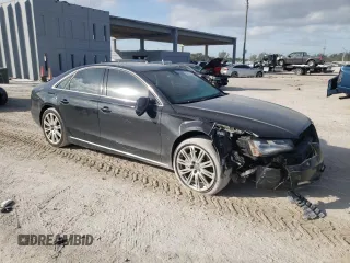 2013 Audi A8 3.0L with VIN WAUAGAFDXDN032766, listed as a Copart auction lot 84275944 with 127,388 mi miles and Salvage title. Bid and sale history available at DreamBid. Image 4.