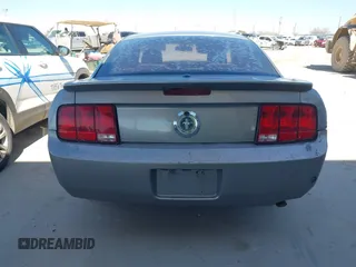 2009 Ford Mustang with VIN 1ZVHT80N595134732, listed as a IAAI auction lot 40931192 with 145,401 mi miles and . Bid and sale history available at carsss.com. Image 17.