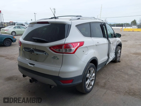 2013 Ford Escape SEL with VIN 1FMCU0H99DUB83641, listed as a IAAI auction lot 41578882 with 124,872 mi miles. Bid and sale history available at carsss.com. Image 4.