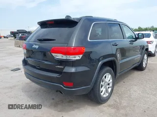 2014 Jeep Grand Cherokee Laredo with VIN 1C4RJFAG8EC440119, listed as a IAAI auction lot 42030855 with 179,392 mi miles and . Bid and sale history available at DreamBid. Image 4.