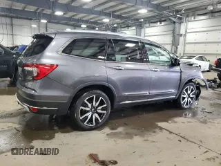 2020 Honda Pilot Touring 8-Passenger with VIN 5FNYF6H96LB052407, listed as a Copart auction lot 44211725 with 53,009 mi miles and Salvage Title. Bid and sale history available at DreamBid. Image 3.