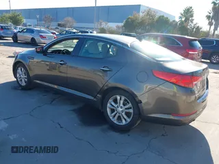 2013 Kia Optima LX with VIN 5XXGM4A74DG114626, listed as a IAAI auction lot 41349903 with 126,856 mi miles. Bid and sale history available at carsss.com. Image 3.