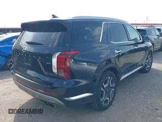 2024 Hyundai Palisade Limited z VIN KM8R5DGE9RU646608, wystawiony jako IAAI lot #42506228 z przebiegiem 54 895 mil mil oraz . Historia ofert i sprzedaży dostępna na DreamBid. Obrazek 4.