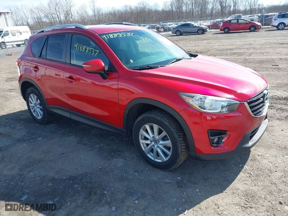 2016 Mazda CX-5 Touring with VIN JM3KE4CY5G0816285, listed as a IAAI auction lot 41888537 with 101,598 mi miles. Bid and sale history available at carsss.com. Image 1.