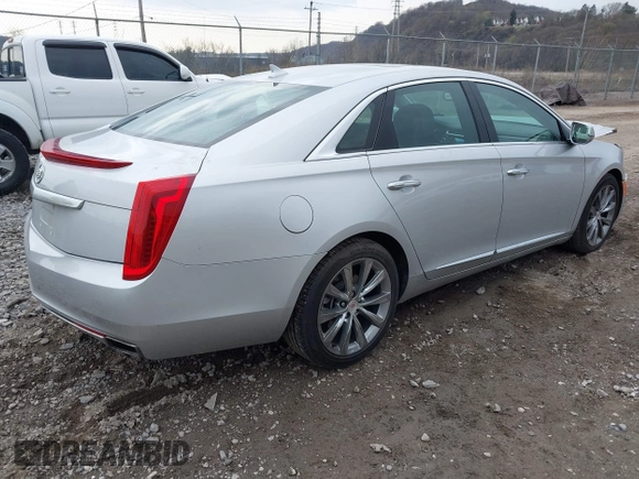 2013 Cadillac XTS Luxury with VIN 2G61P5S3XD9182910, listed as a IAAI auction lot 41940764 with 21,610 mi miles and . Bid and sale history available at DreamBid. Image 4.