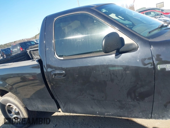 2003 Ford F-150 XL with VIN 1FTRF17223NA54202, listed as a IAAI auction lot 41535299 with Not Provided miles and . Bid and sale history available at DreamBid. Image 13.