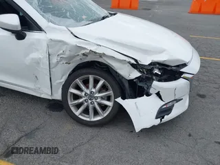 2017 Mazda 3 Touring with VIN 3MZBN1V72HM121902, listed as a IAAI auction lot 39193644 with 40,113 mi miles and . Bid and sale history available at DreamBid. Image 6.