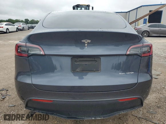 2023 Tesla Model Y Long Range z VIN 7SAYGDEE4PF752292, wystawiony jako Copart lot #53824185 z przebiegiem 61 470 mil mil oraz Szkoda całkowita • Salvage title. Historia ofert i sprzedaży dostępna na DreamBid. Obrazek 6.