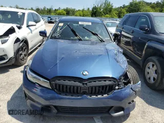 2021 BMW 3 Series 330i with VIN 3MW5R1J06M8B74986, listed as a Copart auction lot 60648895 with Not provided miles and Salvage title. Bid and sale history available at DreamBid. Image 5.