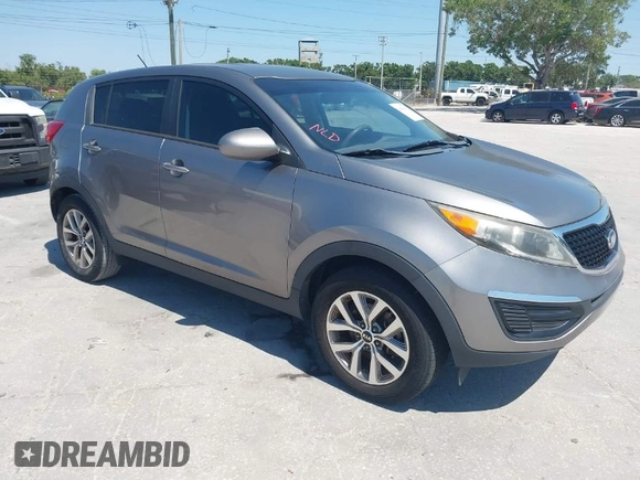 2014 Kia Sportage LX with VIN KNDPB3AC7E7595527, listed as a IAAI auction lot 42062615 with 64,777 mi miles. Bid and sale history available at carsss.com. Image 1.