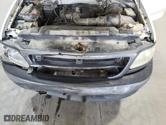 2000 Ford F-150 XL with VIN 1FTZF182XYNC09505, listed as a Copart auction lot 73420184 with 296,202 mi miles and Salvage title. Bid and sale history available at DreamBid. Image 11.