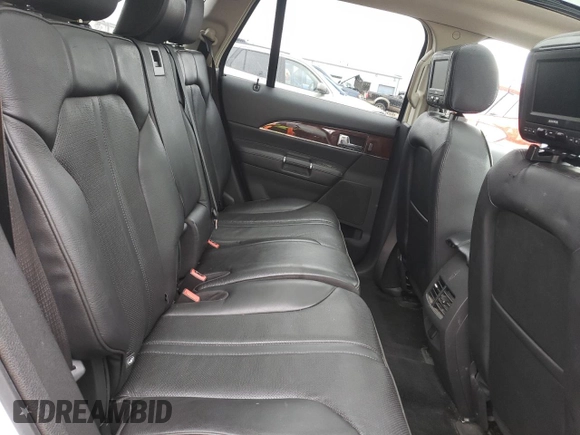 2011 Lincoln MKX z VIN 2LMDJ8JK2BBJ32076, wystawiony jako Copart lot #53683345 z przebiegiem 131 501 mil mil oraz Szkoda całkowita • Salvage title. Historia ofert i sprzedaży dostępna na DreamBid. Obrazek 11.
