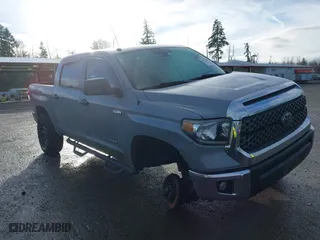 2019 Toyota Tundra 4WD SR5 with VIN 5TFDY5F19KX780050, listed as a IAAI auction lot 41765868 with 64,716 mi miles. Bid and sale history available at carsss.com. Image 1.