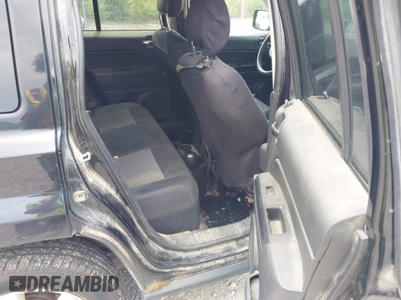 2014 Jeep Patriot Latitude with VIN 1C4NJRFB0ED892203, listed as a IAAI auction lot 42617739 with 100,607 mi miles and . Bid and sale history available at DreamBid. Image 8.