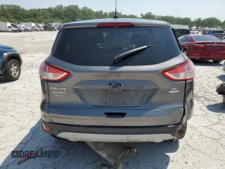 2013 Ford Escape SE with VIN 1FMCU9GX7DUA54057, listed as a Copart auction lot 60040545 with 173,086 mi miles and Salvage title. Bid and sale history available at DreamBid. Image 6.
