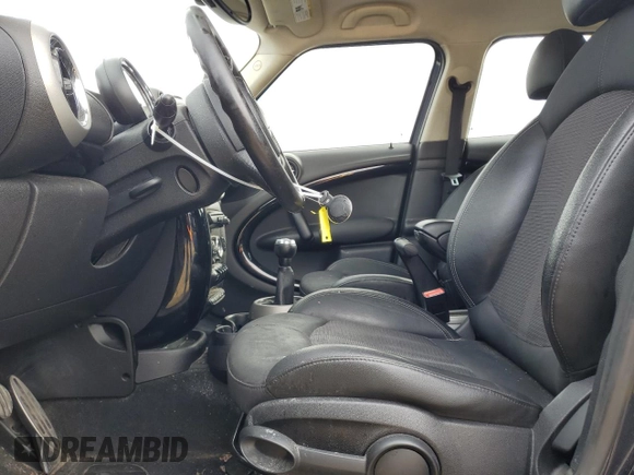 2011 MINI Countryman S with VIN WMWZC5C53BWH99985, listed as a Copart auction lot 89191125 with 90,177 mi miles and Salvage Title. Bid and sale history available at DreamBid. Image 7.