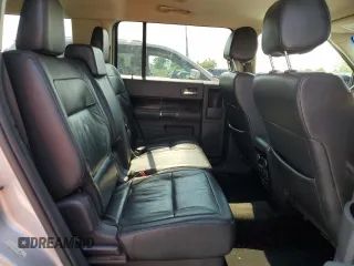 2016 Ford Flex SEL z VIN 2FMGK5C80GBA13231, wystawiony jako Copart lot #60493695 z przebiegiem 180 752 mil mil oraz Czysty tytuł • Clean title. Historia ofert i sprzedaży dostępna na DreamBid. Obrazek 11.