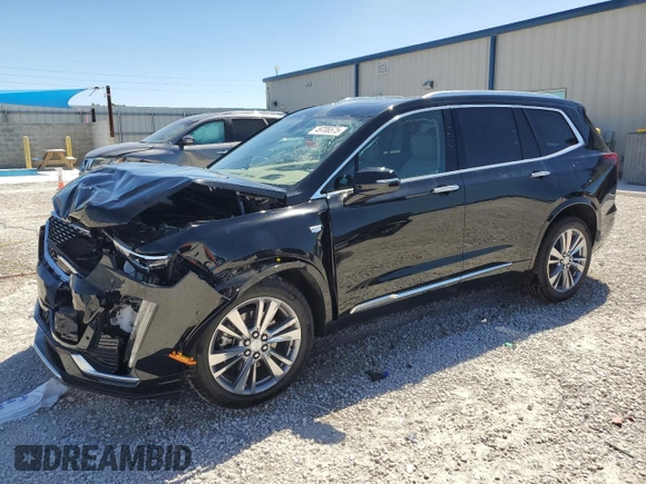 2024 Cadillac XT6 Premium Luxury z VIN 1GYKPERS1RZ755490, wystawiony jako Copart lot #49706575 z przebiegiem 4 239 mil mil oraz Szkoda całkowita • Salvage title. Historia ofert i sprzedaży dostępna na DreamBid. Obrazek 1.