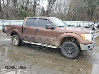 2011 Ford F-150 XLT with VIN 1FTFW1ET0BFB29339, listed as a Copart auction lot 45749965 with 277,547 mi miles and Salvage Title. Bid and sale history available at carsss.com. Image 4.