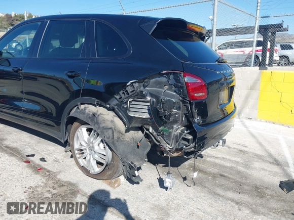 2014 Porsche Cayenne Diesel with VIN WP1AF2A20ELA35222, listed as a IAAI auction lot 41860957 with 124,530 mi miles and . Bid and sale history available at DreamBid. Image 6.
