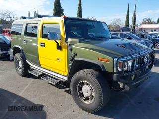 2003 Hummer H2 z VIN 5GRGN23UX3H124727, wystawiony jako IAAI lot #41697787 z przebiegiem 241 554 mil mil oraz . Historia ofert i sprzedaży dostępna na DreamBid. Obrazek 1.
