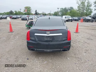 2014 Cadillac CTS Luxury AWD with VIN 1G6AX5SX9E0197395, listed as a IAAI auction lot 42211452 with 90,657 mi miles and . Bid and sale history available at DreamBid. Image 16.