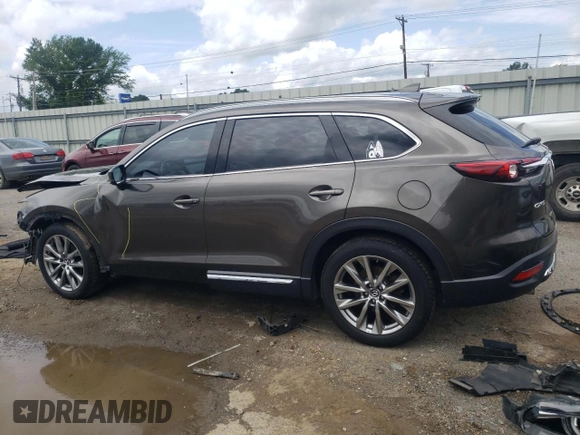 2018 Mazda CX-9 Grand Touring с VIN JM3TCADY9J0205299, выставлен на аукционе Copart как лот 60306095 с пробегом 113 766 миль миль и Списание • Salvage title. История ставок и продаж доступна на DreamBid. Изображение 2.