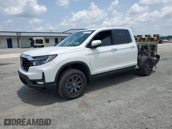 2023 Honda Ridgeline RTL-E with VIN 5FPYK3F7XPB027874, listed as a Copart auction lot 63771315 with 11,945 mi miles and Salvage title. Bid and sale history available at DreamBid. Image 1.