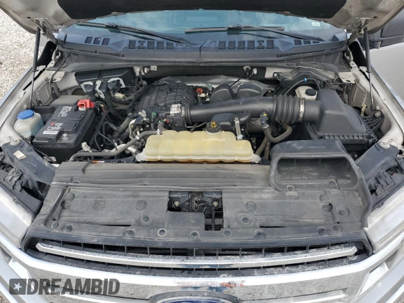 2020 Ford F-150 XL with VIN 1FTEW1EB6LFA98814, listed as a Copart auction lot 60810255 with 137,672 mi miles and Salvage title. Bid and sale history available at DreamBid. Image 11.