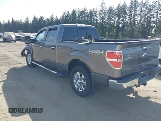 2014 Ford F-150 XL with VIN 1FTFW1ET5EFA77288, listed as a IAAI auction lot 42106634 with 74,582 mi miles. Bid and sale history available at carsss.com. Image 3.
