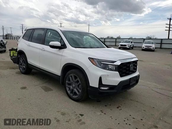 2023 Honda Passport EX-L z VIN 5FNYF8H56PB023651, wystawiony jako Copart lot #51015165 z przebiegiem 24 144 mil mil oraz Szkoda całkowita • Salvage title. Historia ofert i sprzedaży dostępna na DreamBid. Obrazek 11.