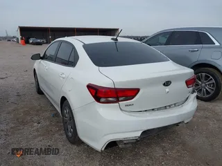 2019 Kia Rio S with VIN 3KPA24ABXKE215756, listed as a IAAI auction lot 41556461 with 122,300 mi miles. Bid and sale history available at carsss.com. Image 3.