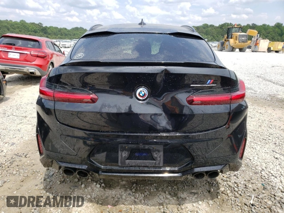 2022 BMW X4 M z VIN 5YM23EC02N9M62773, wystawiony jako Copart lot #53100254 z przebiegiem 9566 mil mil oraz Szkody całkowita. Historia ofert i sprzedaży dostępna na DreamBid. Obrazek 6.