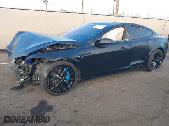 2022 Tesla Model S with VIN 5YJSA1E57NF493457, listed as a IAAI auction lot 41456284 with Not Provided miles and . Bid and sale history available at DreamBid. Image 19.