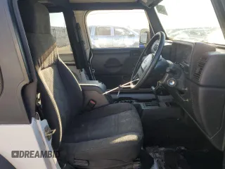 2004 Jeep Wrangler Sport Right Hand Drive with VIN 1J4F449S24P802440, listed as a Copart auction lot 47664495 with 138,950 mi miles and Clean Title. Bid and sale history available at carsss.com. Image 7.