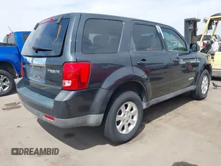 2008 Mazda Tribute ES with VIN 4F2CZ06188KM01024, listed as a IAAI auction lot 41890148 with 122,367 mi miles. Bid and sale history available at carsss.com. Image 4.