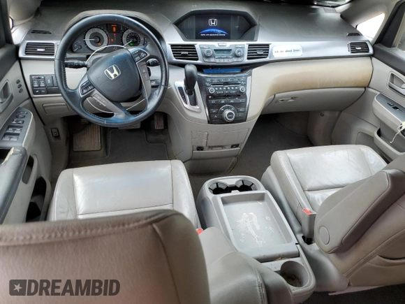 2012 Honda Odyssey Touring with VIN 5FNRL5H96CB045514, listed as a Copart auction lot 54698355 with 217,787 mi miles and Clean Title. Bid and sale history available at DreamBid. Image 8.
