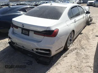 2020 BMW 7 Series 740i z VIN WBA7T2C09LCD15735, wystawiony jako Copart lot #54098325 z przebiegiem Nie podano mil oraz Szkoda całkowita • Salvage title. Historia ofert i sprzedaży dostępna na DreamBid. Obrazek 3.