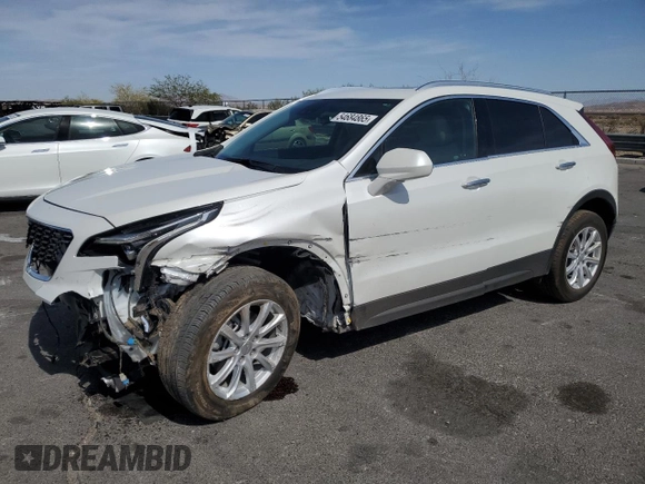 2023 Cadillac XT4 FWD Luxury with VIN 1GYAZAR46PF134602, listed as a Copart auction lot 54684865 with 13,221 mi miles and Salvage title. Bid and sale history available at DreamBid. Image 1.