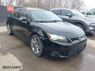 2011 Scion tC with VIN JTKJF5C77B3016747, listed as a IAAI auction lot 41851288 with 112,115 mi miles. Bid and sale history available at carsss.com. Image 1.