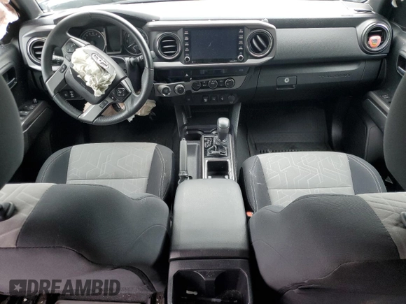 2021 Toyota Tacoma SR z VIN 3TYCZ5ANXMT050566, wystawiony jako Copart lot #57315615 z przebiegiem Nie podano mil oraz Szkoda całkowita • Salvage title. Historia ofert i sprzedaży dostępna na DreamBid. Obrazek 8.