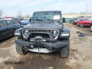 2024 Jeep Gladiator Rubicon z VIN 1C6JJTBG5RL110669, wystawiony jako IAAI lot #41694630 z przebiegiem 1 189 mil mil oraz . Historia ofert i sprzedaży dostępna na DreamBid. Obrazek 12.