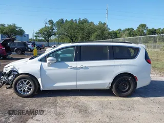 2022 Chrysler Pacifica Touring L with VIN 2C4RC1BGXNR233654, listed as a IAAI auction lot 42137632 with 73,899 mi miles and . Bid and sale history available at DreamBid. Image 15.
