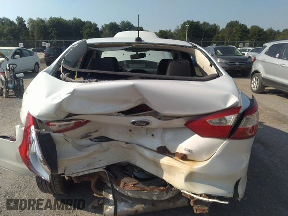 2013 Ford Focus SE with VIN 1FADP3F28DL215983, listed as a IAAI auction lot 42659890 with 117,912 mi miles and . Bid and sale history available at DreamBid. Image 6.